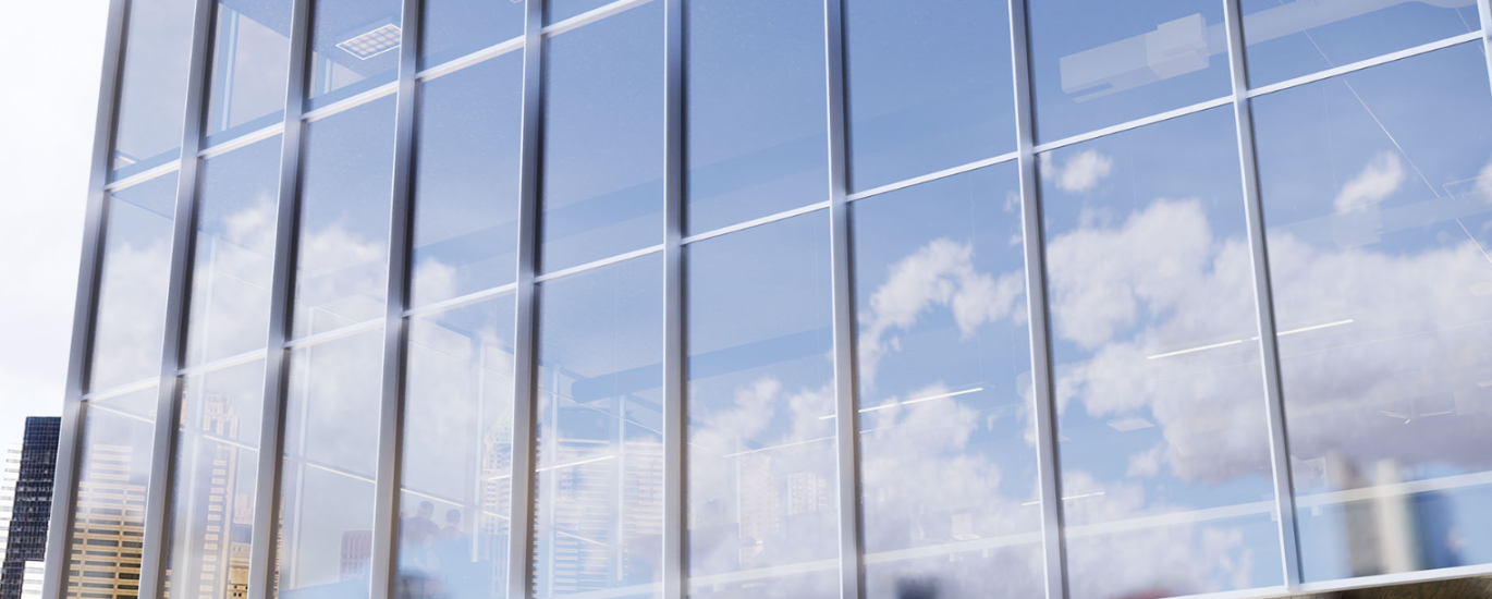 Modern building featuring energy-efficient architectural glass panels for reduced energy use.