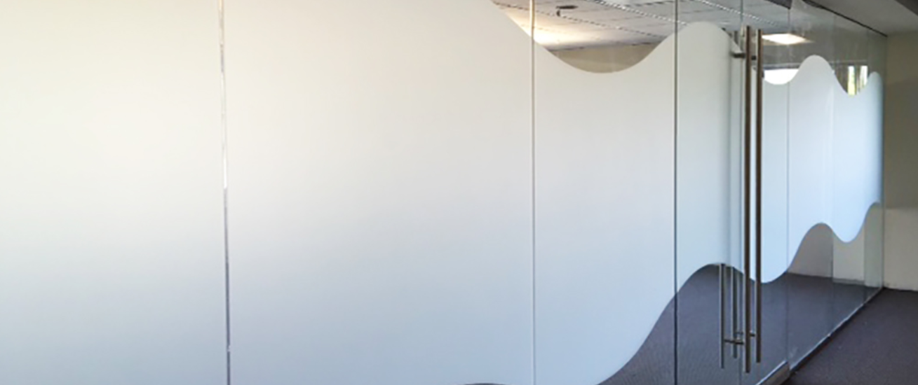 Frosted glass installation providing privacy for modern Punjab home and office spaces by Green Glass Designer.