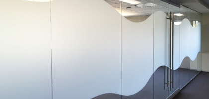 Frosted glass installation providing privacy for modern Punjab home and office spaces by Green Glass Designer.