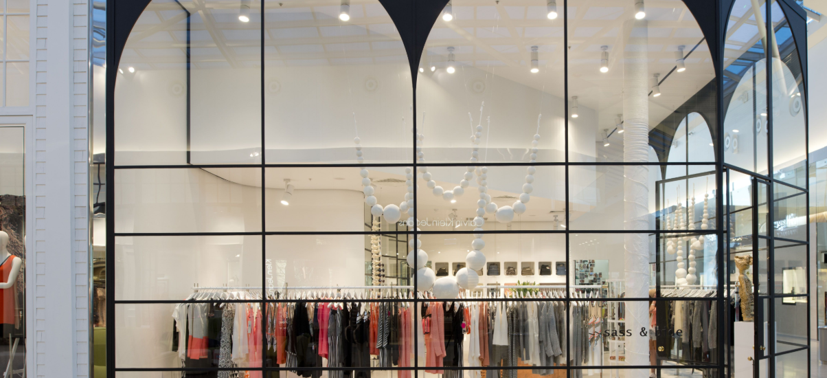 Glass shop front installation showcasing modern design and cost considerations in Pakistan