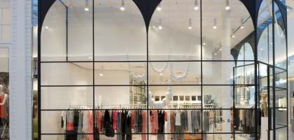 Glass shop front installation showcasing modern design and cost considerations in Pakistan