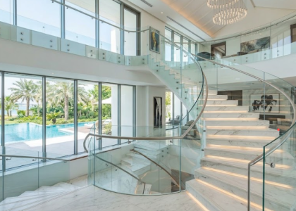 Stair glass railings in a luxury villa