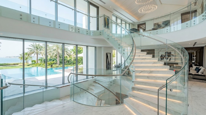 Stair glass railings in a luxury villa